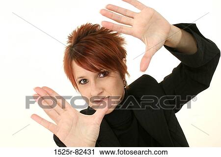 Portrait of a mid adult woman gesturing View Large Photo Image Stock Image - Portrait of a mid adult woman gesturing. Fotosearch
