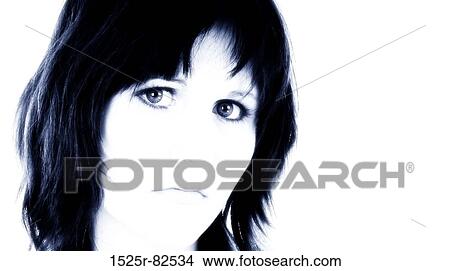 Picture - Portrait of a young woman looking serious. Fotosearch