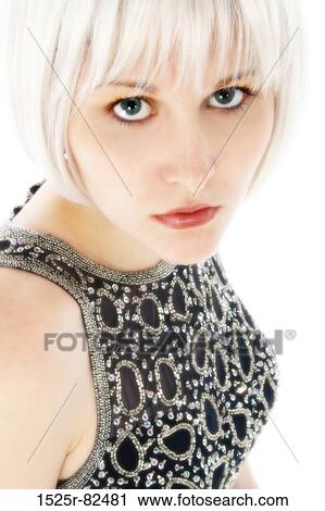 Portrait of a young woman looking serious View Large Photo Image Stock Image - Portrait of a young woman looking serious. Fotosearch