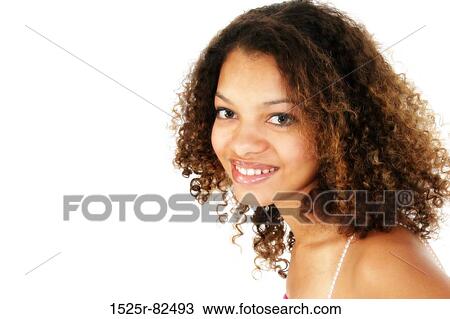 Portrait of a young woman smiling View Large Photo Image Stock Image - Portrait of a young woman smiling. Fotosearch