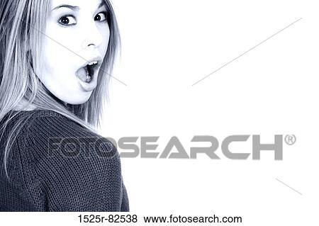 Portrait of a young woman with her mouth open View Large Photo Image Stock Photo - Portrait of a young woman with her mouth open. Fotosearch