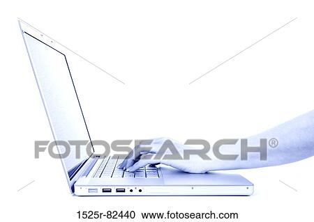 Stock Image - Woman's hand working on a laptop. Fotosearch
