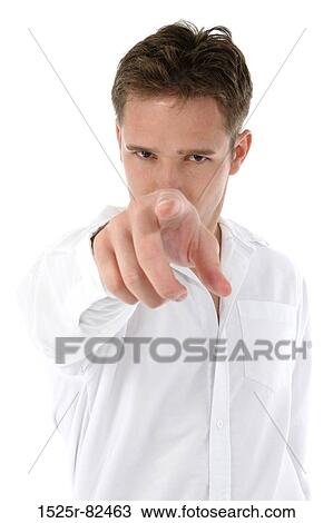 Young man pointing forward with his index finger View Large Photo Image Stock Image - Young man pointing forward with his index finger. Fotosearch