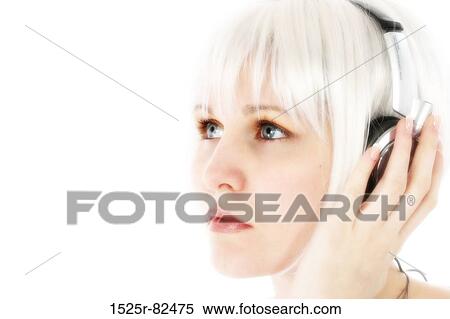 Young woman listening to music View Large Photo Image Stock Photography - Young woman listening to music. Fotosearch