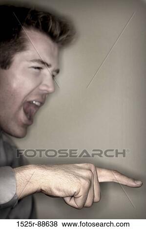 Brown hair businessman wearing gray shirt is shouting at the top of his lungs View Large Photo Image Stock Photo - Brown hair businessman wearing gray shirt is shouting at the top of his lungs. Fotosearch
