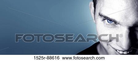 Man's Blue eyes on blue blackground View Large Photo Image Stock Photograph - Man's Blue eyes on blue blackground. Fotosearch