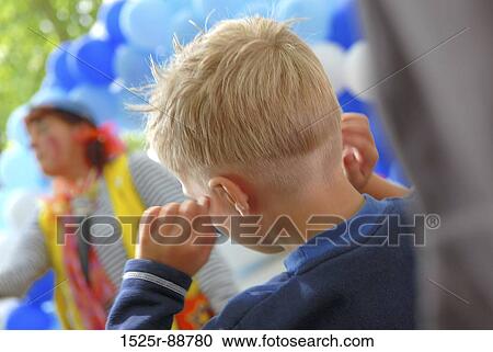 Rear view of a boy View Large Photo Image Stock Image - Rear view of a boy. Fotosearch