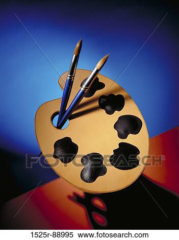 Close-up of two paintbrushes with a palette View Large Photo Image Stock Photography - Close-up of two paintbrushes with a palette. Fotosearch