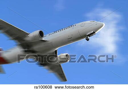 Airplane in flight View Large Photo Image Stock Photo - Airplane in flight. Fotosearch