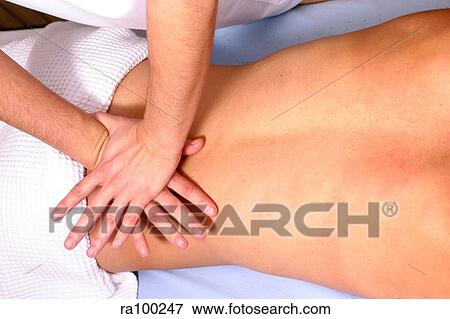 Back massage View Large Photo Image Stock Photo - Back massage. Fotosearch