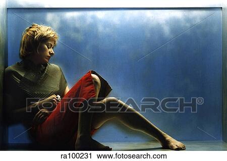 Stock Image - Backlit woman. Fotosearch