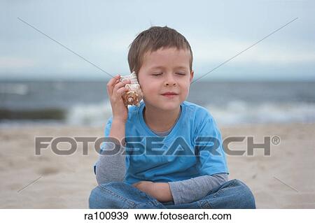 Boy on beach View Large Photo Image Stock Photo - Boy on beach. Fotosearch
