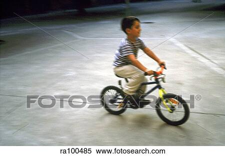 Boy on bike View Large Photo Image Stock Photography - Boy on bike. Fotosearch