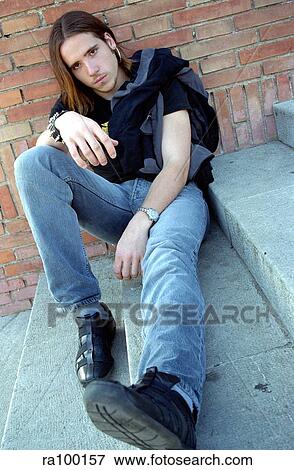 Boy on steps View Large Photo Image Stock Photo - Boy on steps. Fotosearch
