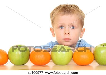 Boy with apples View Large Photo Image Stock Photo - Boy with apples. Fotosearch