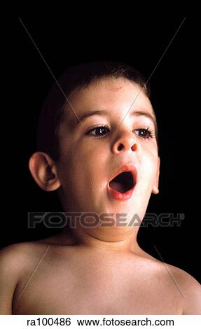 Boy yawning View Large Photo Image Stock Photograph - Boy yawning. Fotosearch