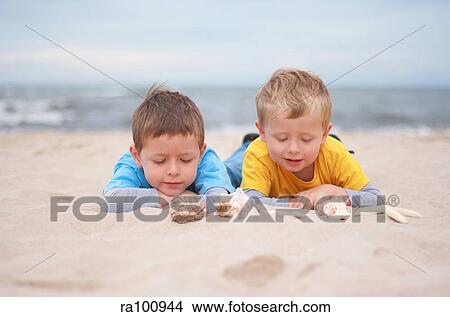 Boys by the sea View Large Photo Image Picture - Boys by the sea. Fotosearch