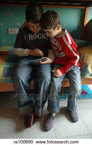 Boys gaming View Large Photo Image Stock Image - Boys gaming. Fotosearch