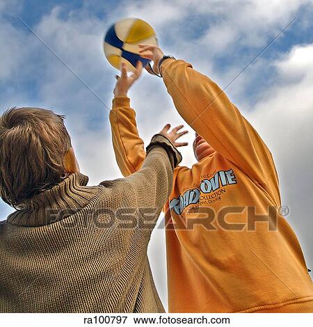 Boys playing ball View Large Photo Image Stock Photo - Boys playing ball. Fotosearch