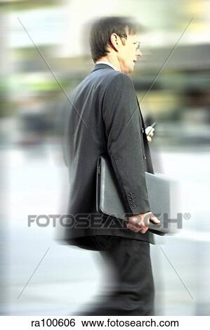 Businessman walking View Large Photo Image Stock Photograph - Businessman walking. Fotosearch