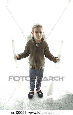 Stock Image - Child in slippers. Fotosearch