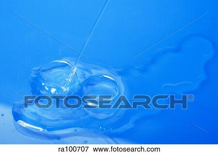Stock Photo - Contact lens fluid. Fotosearch