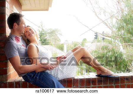 Couple relaxing View Large Photo Image Stock Photo - Couple relaxing. Fotosearch