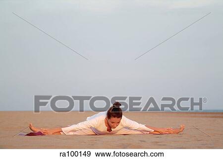 Stock Photo - Exercise on beach. Fotosearch