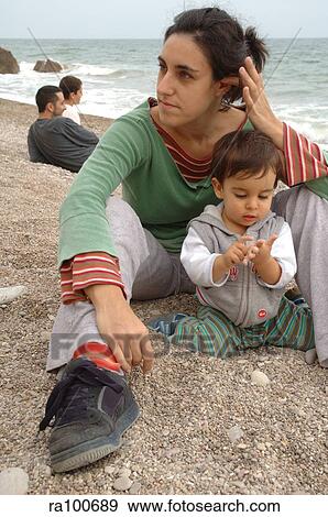 Family on beach View Large Photo Image Stock Photo - Family on beach. Fotosearch