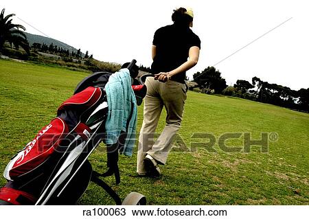 Stock Image - Golf caddy. Fotosearch