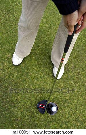 Golfer putting View Large Photo Image Stock Image - Golfer putting. Fotosearch