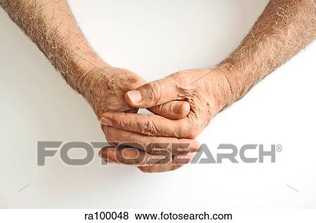 Stock Photo - Hands clasped. Fotosearch