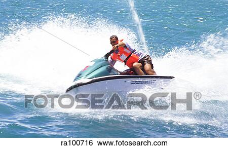 Jet skiing View Large Photo Image Stock Photograph - Jet skiing. Fotosearch