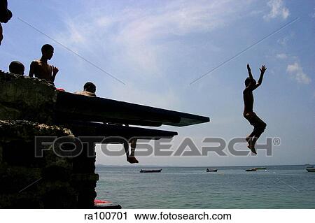 Jumping from jetty View Large Photo Image Stock Image - Jumping from jetty. Fotosearch