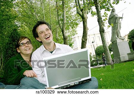 Stock Photo - Laptop in the park. Fotosearch