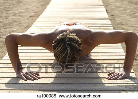 Man doing press ups View Large Photo Image Stock Photography - Man doing press ups. Fotosearch