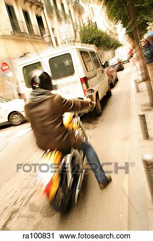 Moped man View Large Photo Image Stock Image - Moped man. Fotosearch