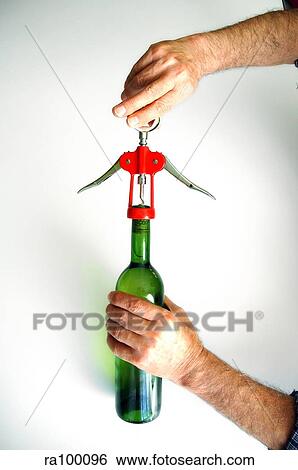Opening wine bottle View Large Photo Image Stock Photograph - Opening wine bottle. Fotosearch