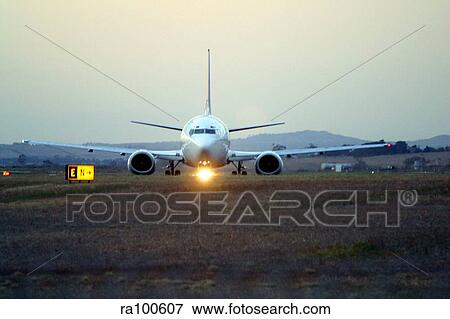 Plane on runway View Large Photo Image Stock Photo - Plane on runway. Fotosearch