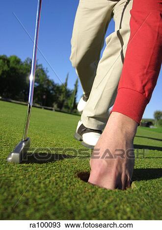Retrieving golf ball View Large Photo Image Stock Image - Retrieving golf ball. Fotosearch