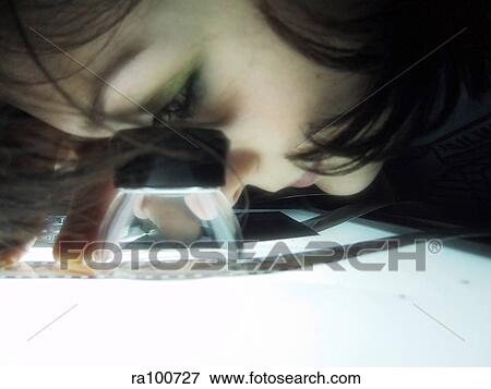 Selecting the photos View Large Photo Image Stock Photo - Selecting the photos. Fotosearch