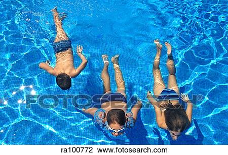 Swimming in the pool View Large Photo Image Stock Image - Swimming in the pool. Fotosearch