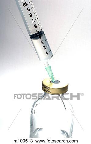 Syringe and bottle View Large Photo Image Stock Image - Syringe and bottle. Fotosearch