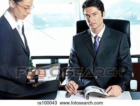 Two business people View Large Photo Image Stock Image - Two business people. Fotosearch