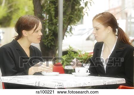 Stock Image - Two people lunching. Fotosearch