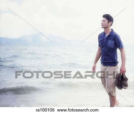 Walking on the beach View Large Photo Image Stock Photography - Walking on the beach. Fotosearch