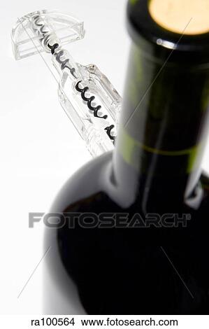 Wine bottle and cork screw View Large Photo Image Picture - Wine bottle and cork screw. Fotosearch