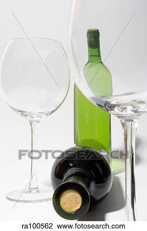 Wine bottles and glasses View Large Photo Image Stock Image - Wine bottles and glasses. Fotosearch