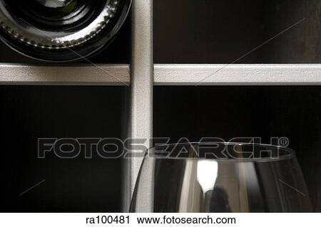 Wine rack and glass View Large Photo Image Stock Image - Wine rack and glass. Fotosearch