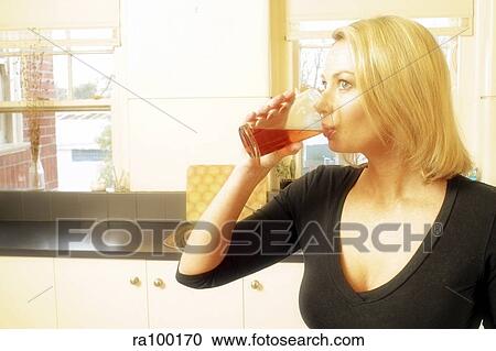 Woman drinking View Large Photo Image Stock Image - Woman drinking. Fotosearch